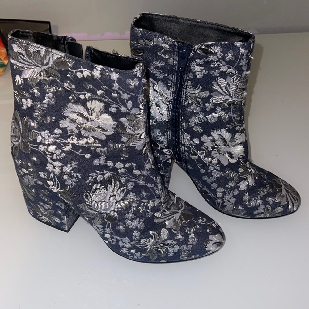 denim with silver floral accents ankle bootie